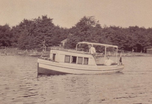A small boat on the water at Leith