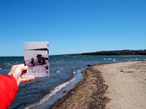 Historic photograph held against the present-day Leith beach