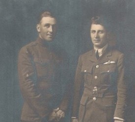 Robert Laird Ahrens and Carl Herman Ahrens in WWI-era military uniforms, studio portrait