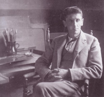 Carl Ahrens in his Roycroft studio in East Aurora, NY, 1900